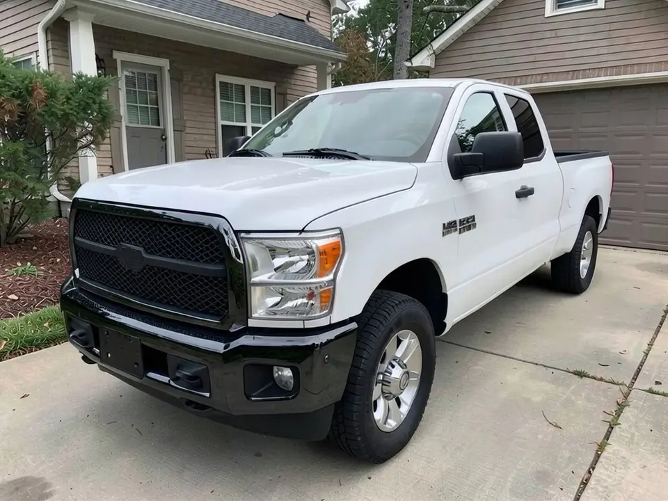 AI-drawn sample: the same truck with a gloss black front bumper and grille surround