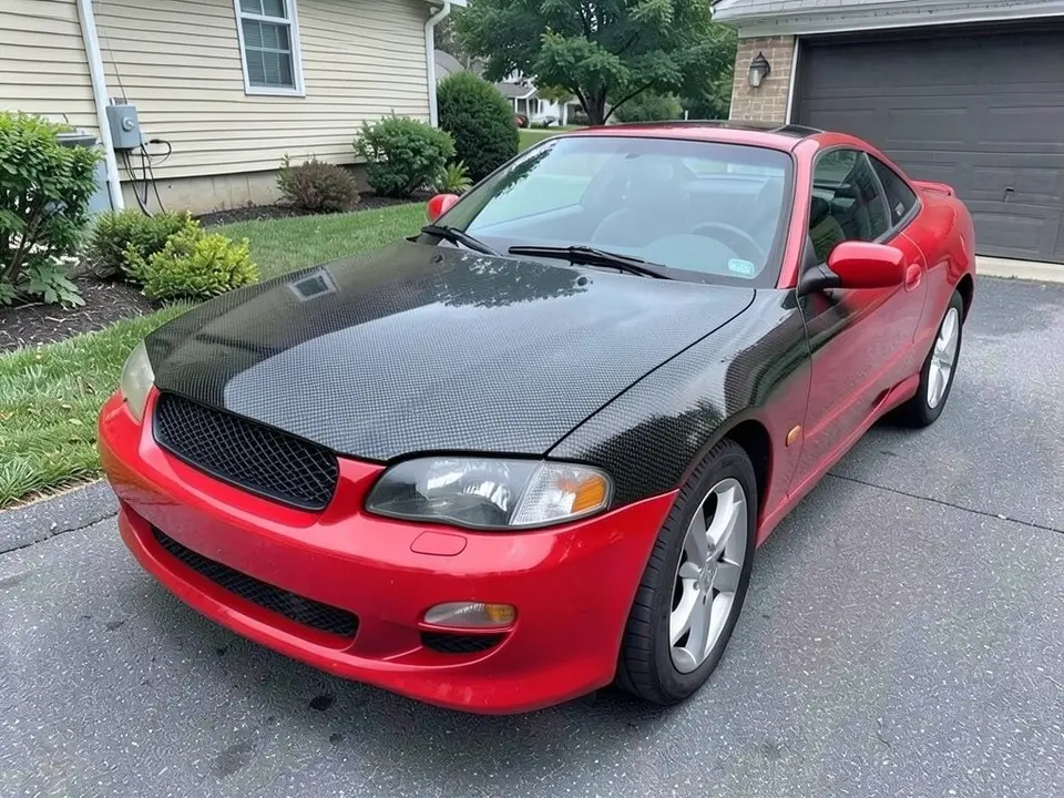 AI-generated sample: a red coupe with a carbon fiber look hood