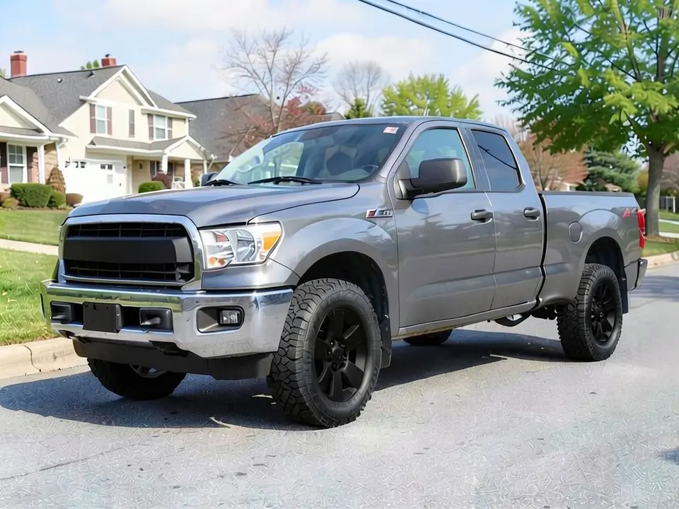 AI-generated sample: a gray crew cab pickup with black wheels