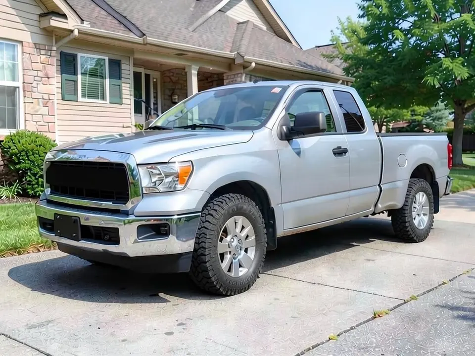 AI-drawn sample: the same silver pickup with larger, chunkier all-terrain tires